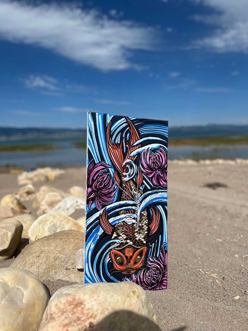 Koi Swimming Down Stream